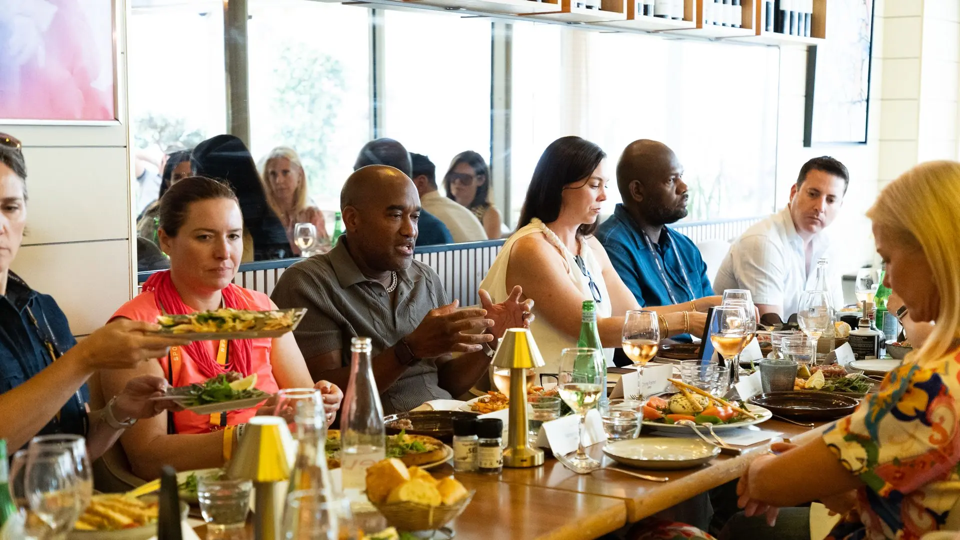 Attendees engage in conversation.